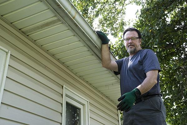 workers at Gutter Cleaning of Central Islip